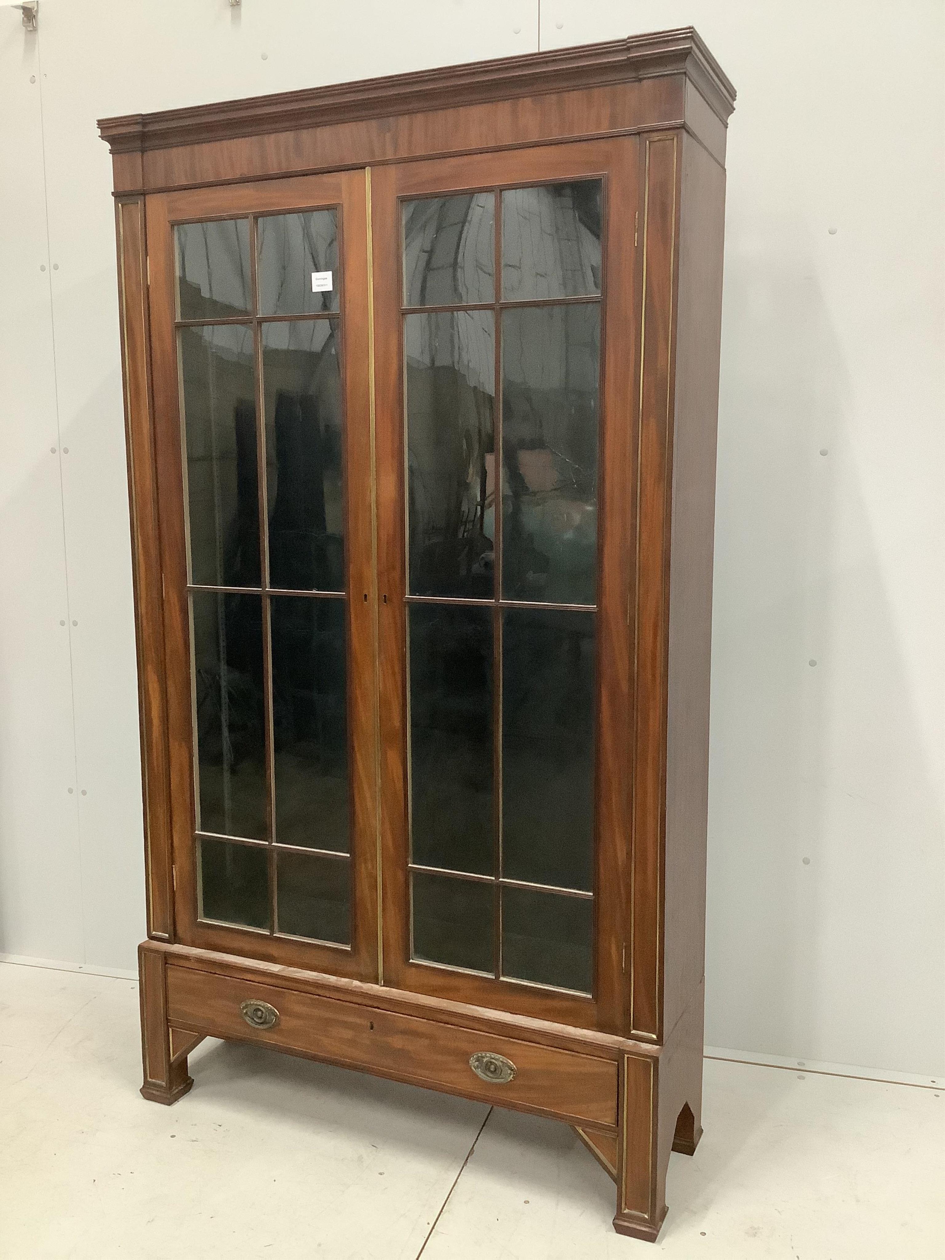 A 19th century French brass mounted mahogany bookcase, width 112cm, depth 32cm, height 195cm. Condition - fair